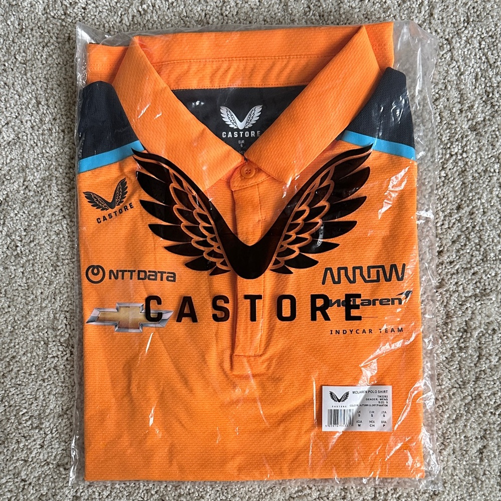 Castore Men's McLaren Orange and black Polo Shirt